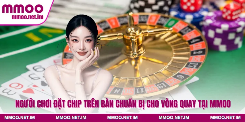Người chơi đặt chip trên bàn chuẩn bị cho vòng quay tại MMOO